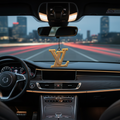 Large LV Logo Freshie hanging from a rearview mirror in a luxury car